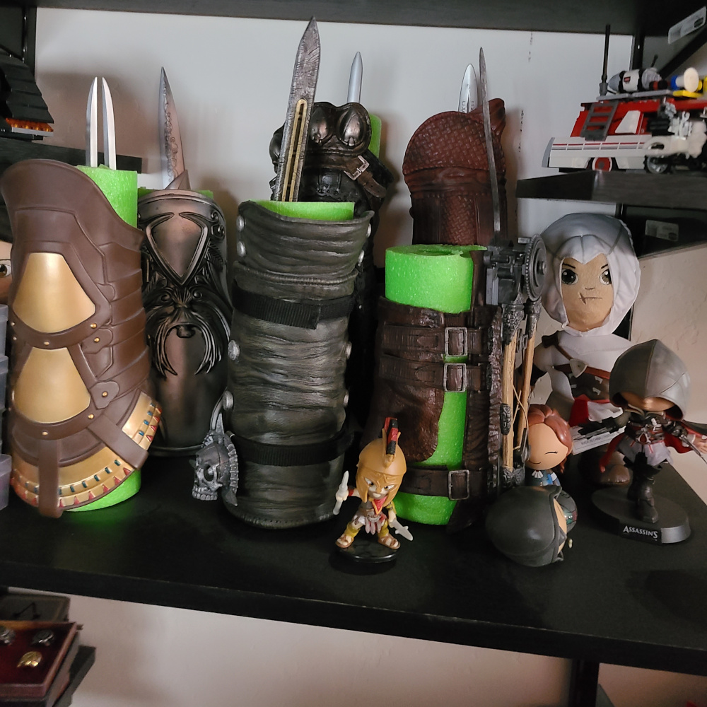 Video game collection and Assassin Creed gear