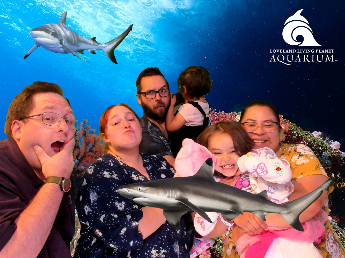 Photo with family for the STG Summer Party at the Aquarium